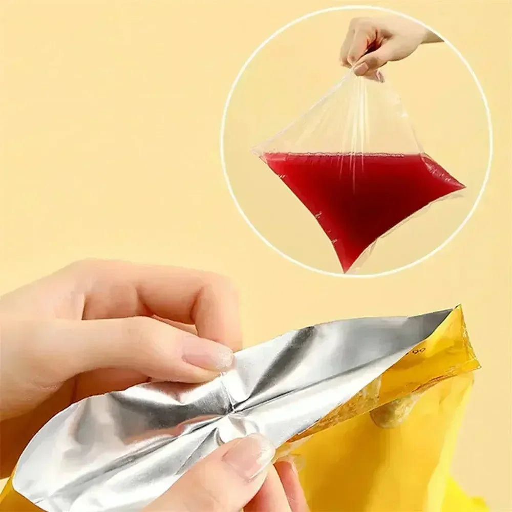 Hand opening a yellow foil bag with an inset showing a hand holding a clear plastic bag filled with red liquid