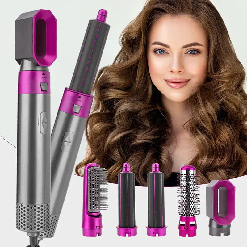 Woman with voluminous curly hair and multi-functional pink and gray hair styling tools including curling barrels, brush, and dryer attachments