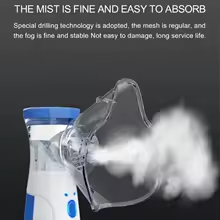 Portable handheld mist spray device emitting fine white mist with blue and white body